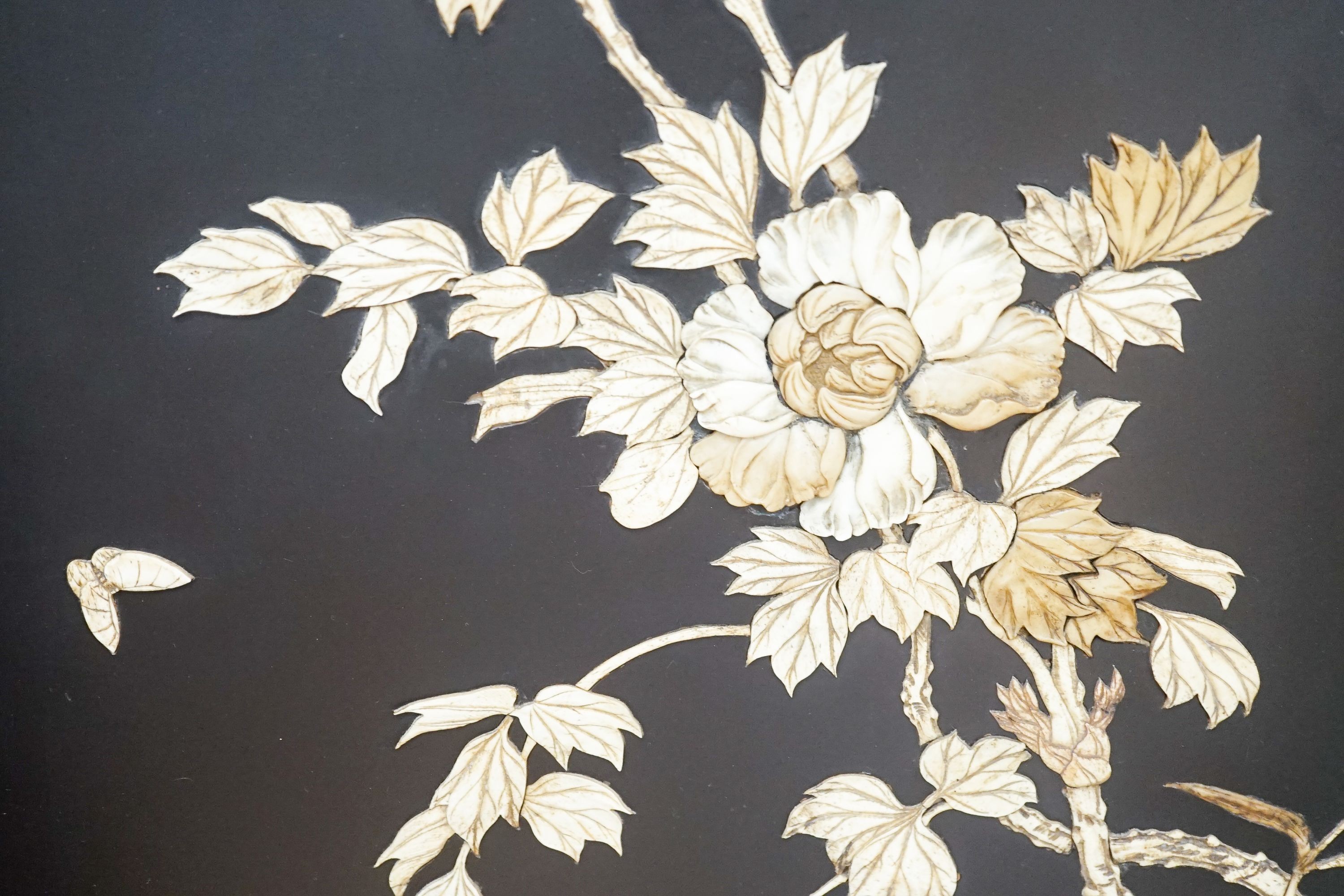 A pair of late 19th century Japanese bone and mother of pearl inlaid shibayama style panels of birds amid flowers, 91 x 51cm
